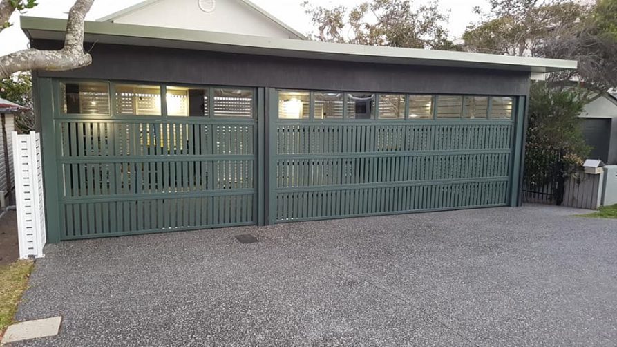 Designer automated garage doors installed for a client.