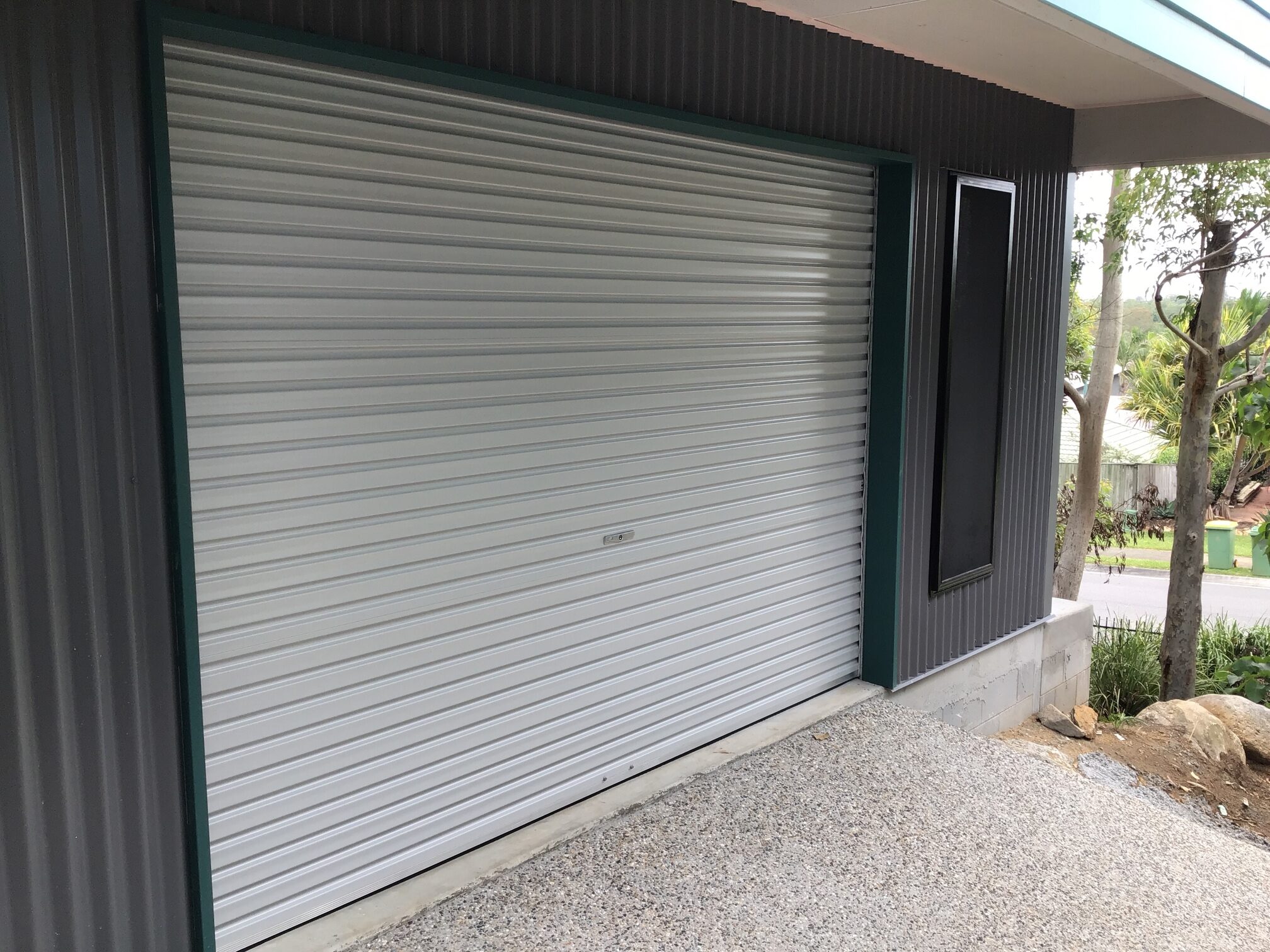 Garage door installation Caloundra coastal property marine grade materials